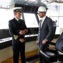 14. april: Kronprinsen åpner seminar, besøker sjømannskirken og får her en orientering om det norske seismikkfartøyet Polarcus Asima, bygget i Dubai (Foto: Lise Åserud, Scanpix)